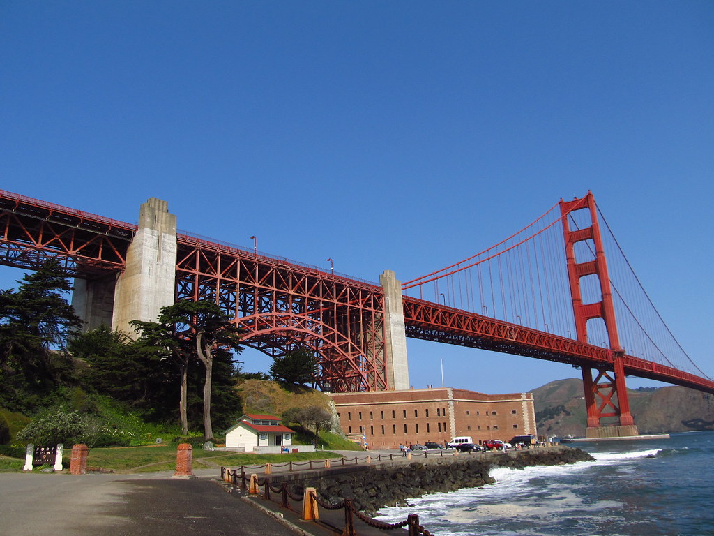 A view towers Fort Point, framed by the Golden Gate Bridge